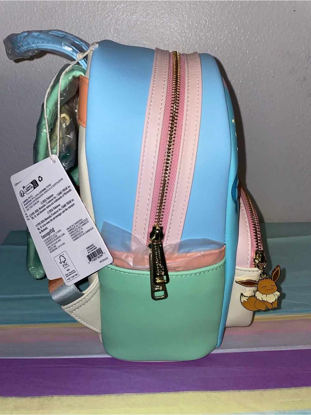 Exclusive Loungefly Pokemon Eevee Evolution Retro Colored Mini Backpack & Wallet